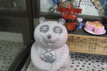 A happy tanuki statue.