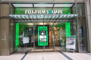 Fujifilm Square's green futuristic entrance is hard to miss in the Tokyo Midtown.