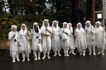 Our tour group is all smiles in our yamabushi clothing after successfully climbing Mt. Haguro and being blessed in the main shrine.