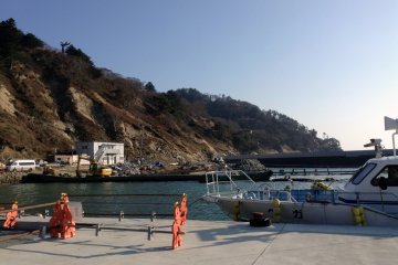 Originally the island port hosted shops, but tsunami and typhoon damage means they no longer exist while the port is still under construction.