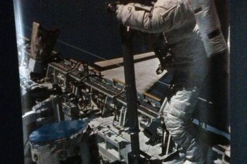 <p>Authentic space photos decorate the hall to the elevator.</p>