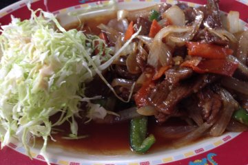 <p>Stir fried vegetables and beef laden with lots of garlic; the meat is tender on the inside but has a crispy charred honey-kissed texture on the outside</p>