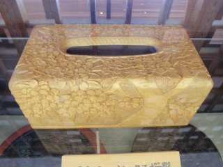 Carved wooden tissue holder