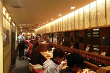 <p>Pleasant neutral hues and lounge music permeate at Ippudo</p>