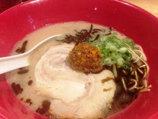 The ingredients in the red ramen are best savored individually before combining.