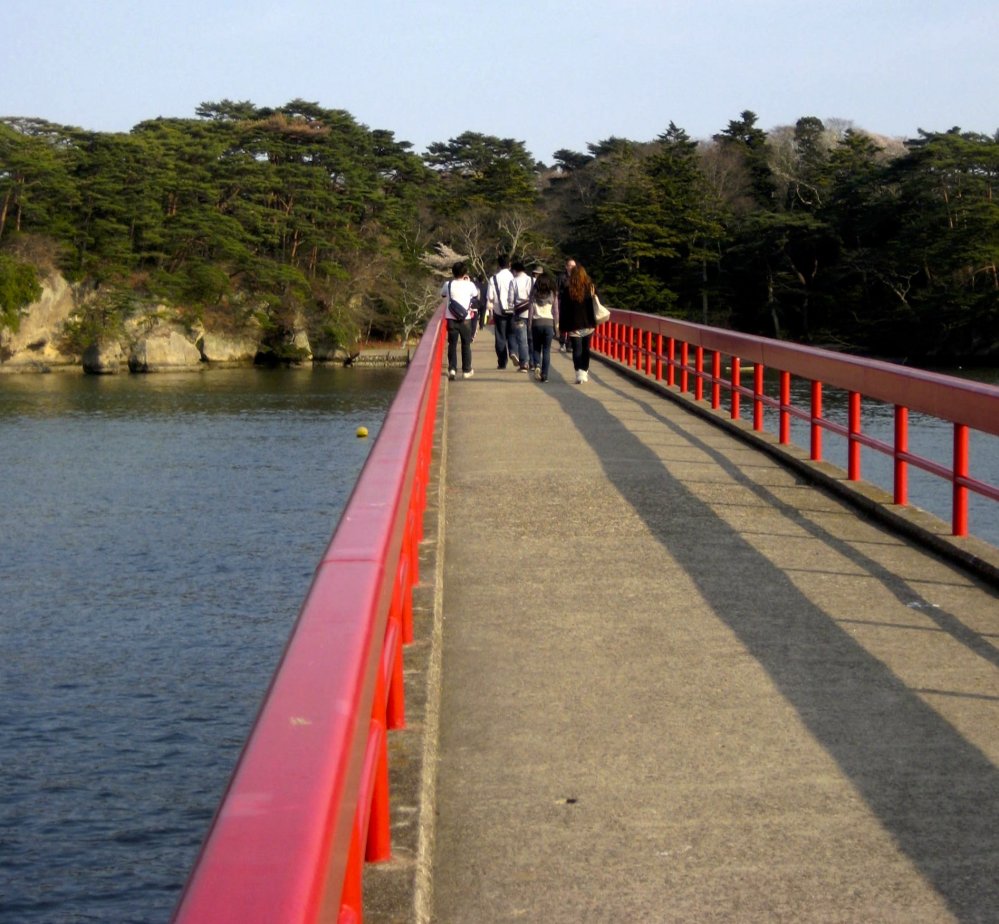 The long bright red foot bridge that connects Fukuurajima to the ticket office and the mainland.