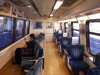 Inside the train; the seats on the left will be facing the ocean as you travel down the coast