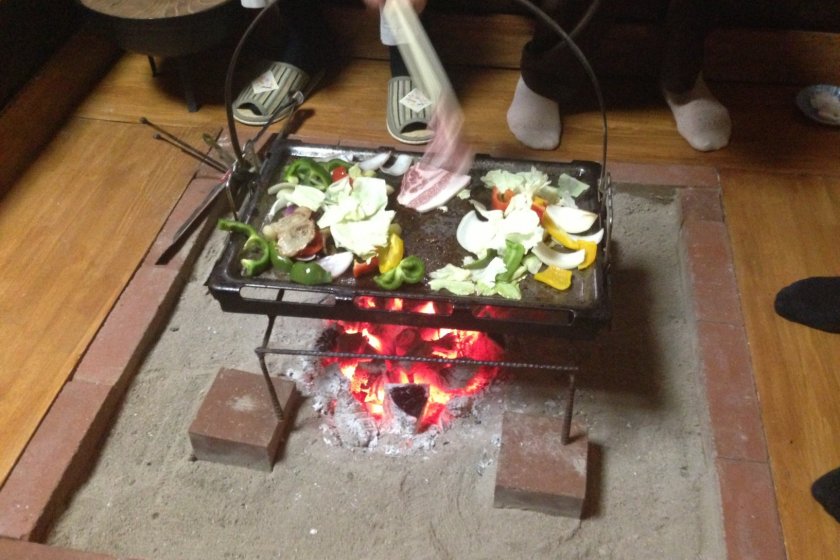 Local food cooked on a hot plate over a danro, or hearth.