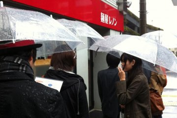 We will wait in the rain for a hot bowl of Lennon Ramen.