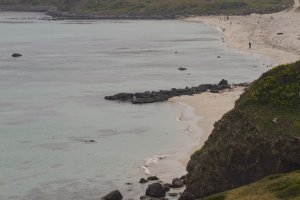 A look at the beach from the rocky cliffs to the west